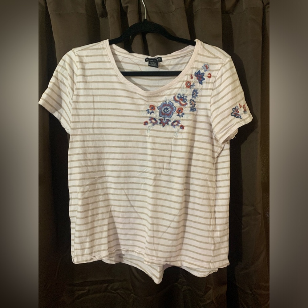 1 white and cream shirt and 1 blue shirt both medium